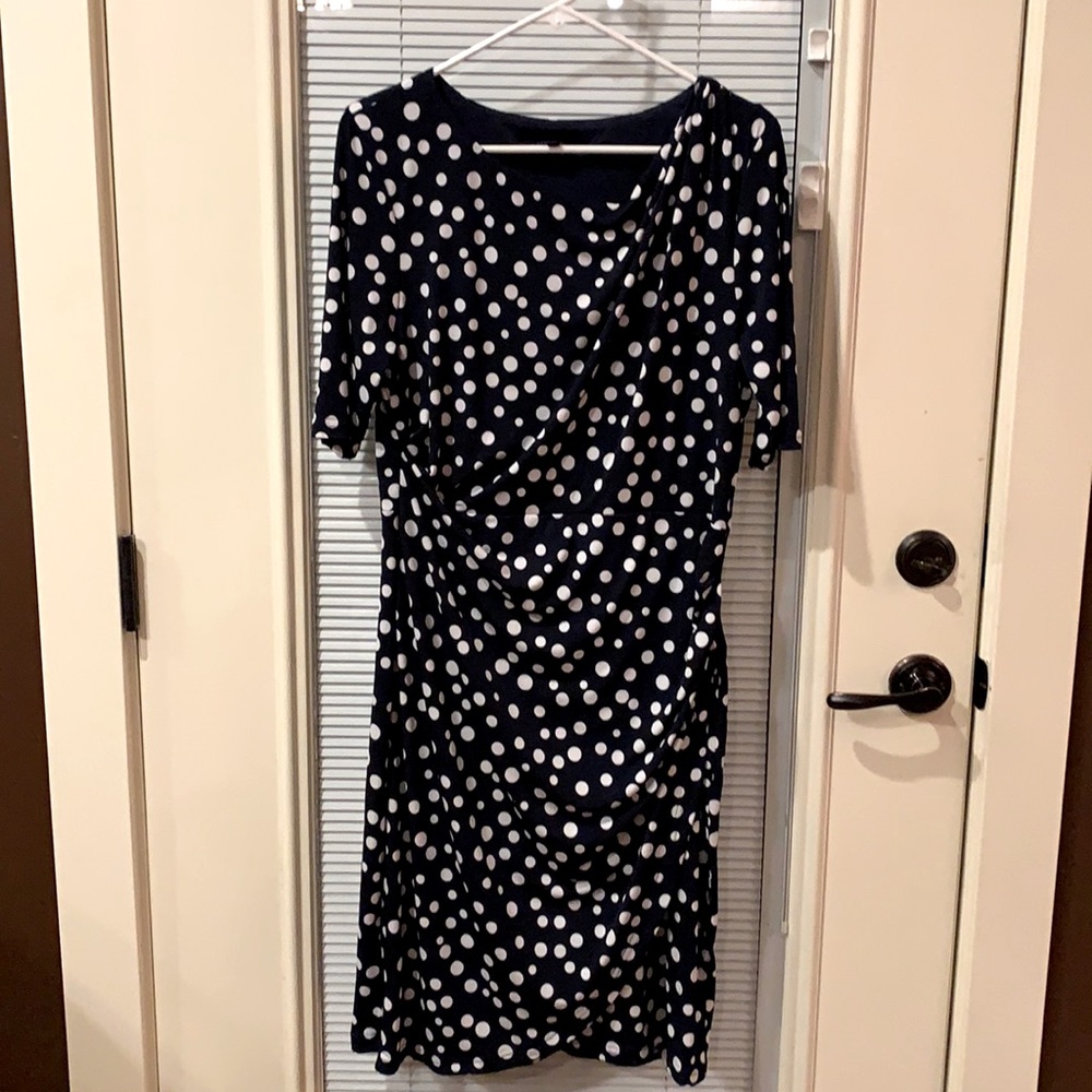 Blue with white polka dots dress short sleeves. Gather at waist.
